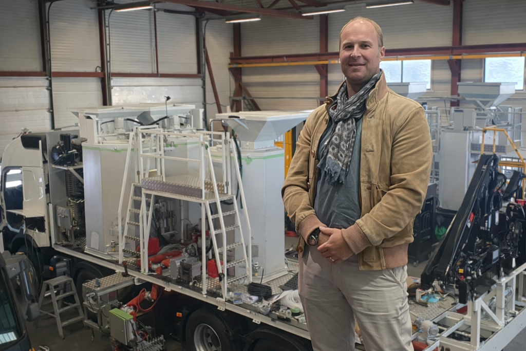 Managing Director Philippe Lambert in front of a Thermoliner thermoplastic road marking truck with Multiapplicator system at Trysil RMM workshop.
